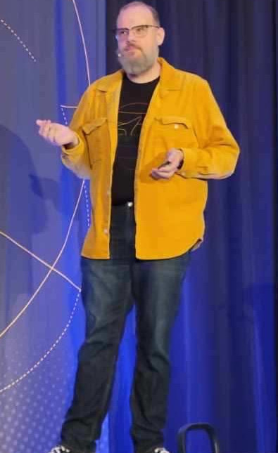Eric Near speaking on stage